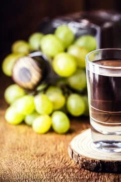 Glass of brandy based on grapes, called bagaceira in Portugal and in Italy Gr Stock Photos