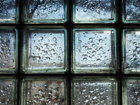 Glass bricks blocks with bubble pattern in window architecture detail 写真素材