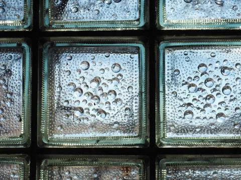 Glass bricks blocks with bubble pattern in window architecture detail 스톡 사진