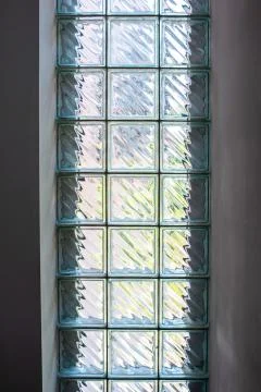 Glass bricks insert panel decoration inside house wall vertical shot Stockfoto's