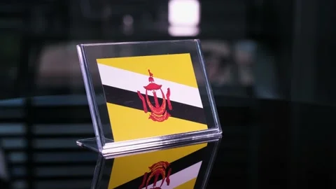 Glass Brunei Flag Rotating On Table 動画素材 208480355