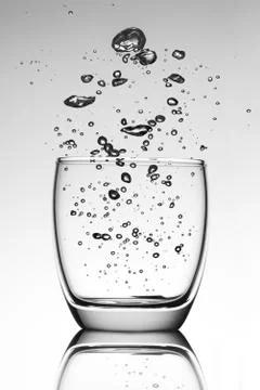 Glass of bubbles in BN Stock Photos