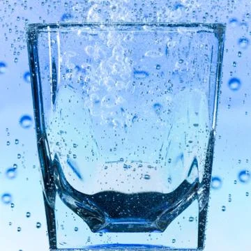 Glass with bubbles Stock Photos