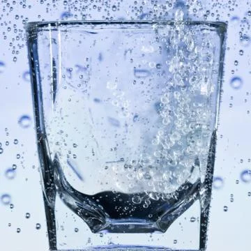 Glass with bubbles Stock Photos