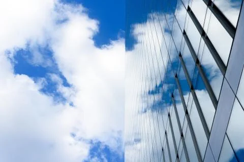 Glass building with cloud reflections Stock Photos