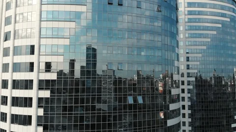 Glass building front view. Reflection on a modern office building. Glass walls Stock Footage 108592766
