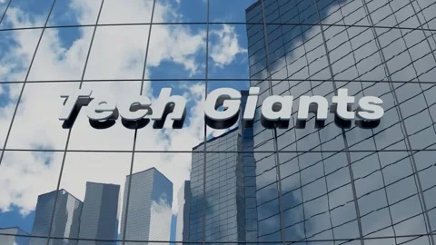 Glass building reflecting clouds with Tech Giants banner on modern skyline Stock Footage 314486486