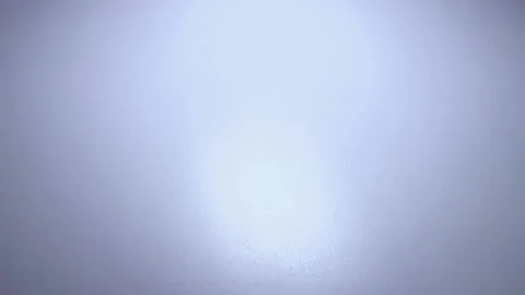 Glass bullets in motion on a white background Stock Footage 168414219