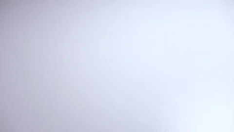 Glass bullets in motion on a white background Stock Footage 168415060