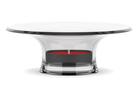 Glass candlestick with small red candle isolated on white background Illustrazione stock
