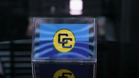 Glass Caricom Flag Rotating On Table Stock-Footage 208482428