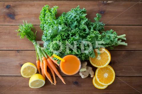 Glass of carrot juice, fruits and vegetables Stock Photos