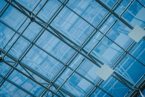 Glass ceiling structure with metal framework and artificial lighting, showc.. Stock Photos