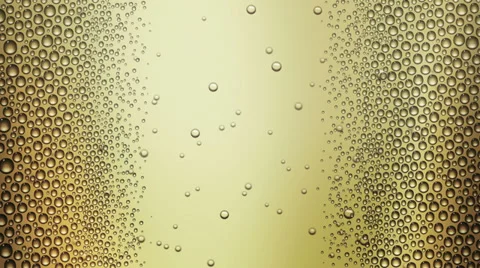 Glass of champagne with droplets (seamless loop) + alpha matte Stock Footage 32200937