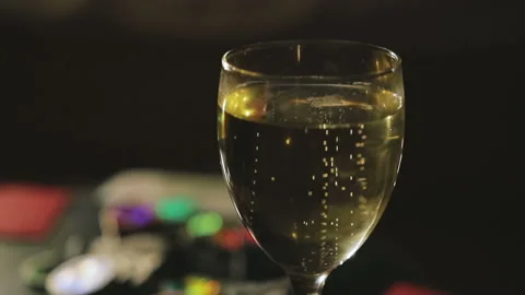 Glass of champagne on the game table 스톡 동영상 87588339