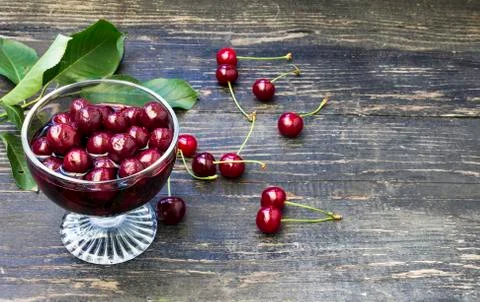 Glass of cherry compote Stock Photos
