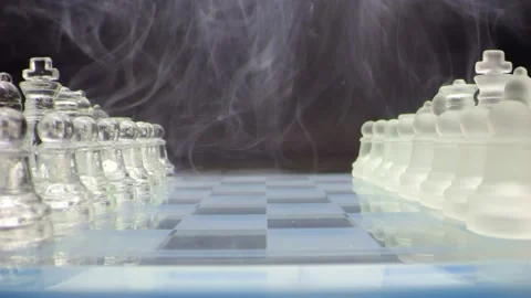 Glass chessboard on a black background. Figures are drowning in smoke. A sy.. Video stock 232492039