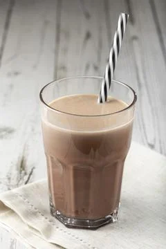 Glass with chocolate on the table. Foto stock