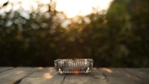 Glass cigarette ashtray Stock Footage 117331891