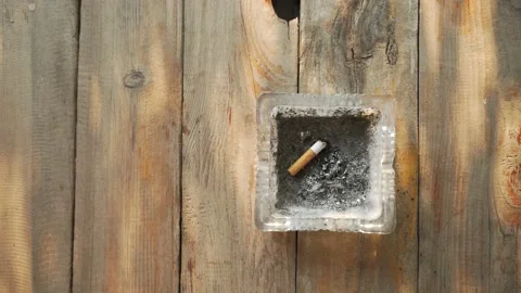 Glass cigarette ashtray Video stock 137012268