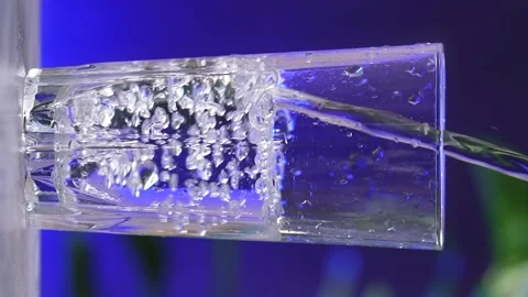 Glass with clean drinking water. Vertical video reels Stock Footage 239255837