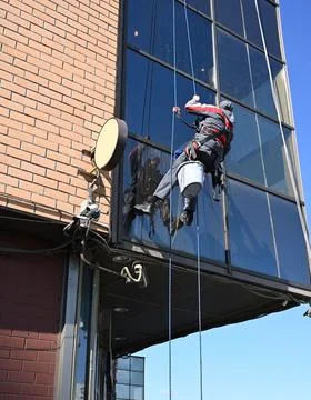Glass cleaner working 写真素材