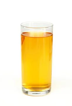Glass of clear amber liquid on table Stock Photos