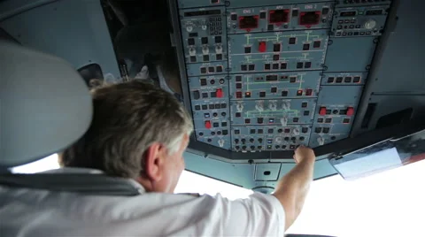 Glass cockpit cabin captain pilot switch controls of aircraft Airbus A319 A320 Stock Footage