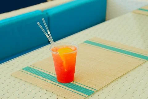 A glass with a cocktail is on the table Stock Photos