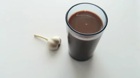 A glass of cocoa on a white background Video stock 152529415