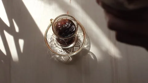 A glass of coffee in the sun. Stock Footage 281857020