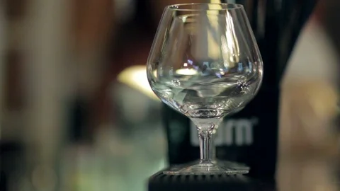 A glass for cognac is on the bar. Stock Footage 88784159
