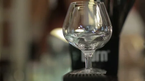 A glass for cognac is on the bar. Stock Footage 88784387