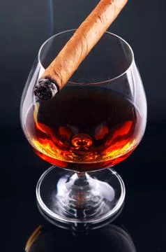 Glass of cognac Stock Photos