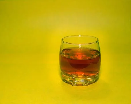 Glass of cognac Stock Photos