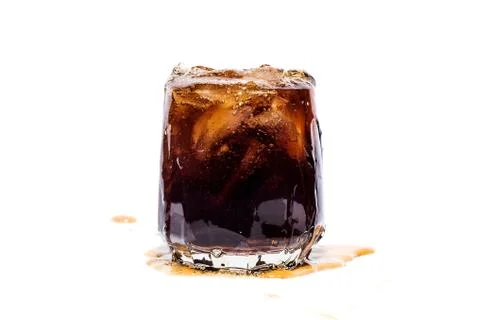 Glass of cola with ice cubes isolate Stock Photos