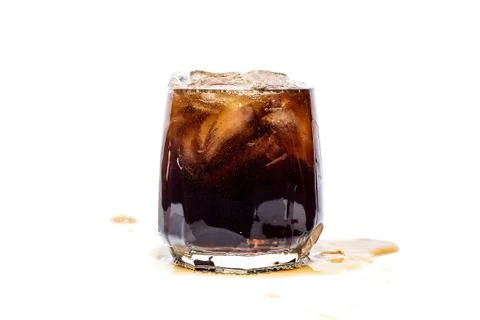 Glass of cola with ice cubes isolate Stock Photos