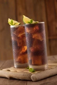 Glass of cola with ice. Stock Photos
