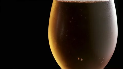Glass with cold beer. bubbles air. Stock footage. copy space Stock Footage 133729535