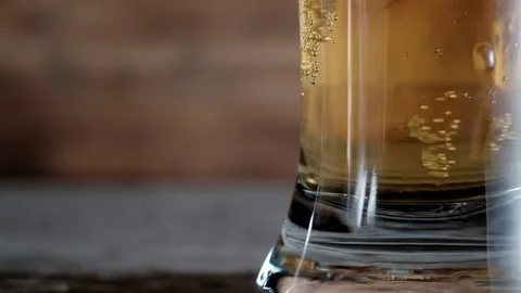 Glass with cold beer. bubbles air. Stock footage. copy space Stock Footage 133729655