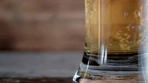 Glass with cold beer. bubbles air. Stock footage. copy space Stock Footage 133731180