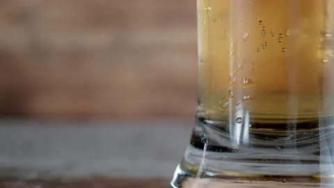 Glass with cold beer. bubbles air. Stock footage. copy space Stock Footage 133731232