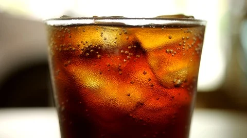 Glass of cold cola with ice cubes Stock-Footage 114264246
