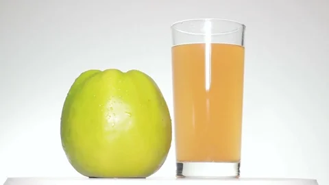 Glass of cold juice, isolated Vidéo 84186839