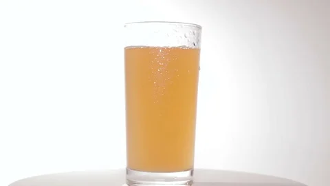 Glass of cold juice, isolated Vidéo 84186937