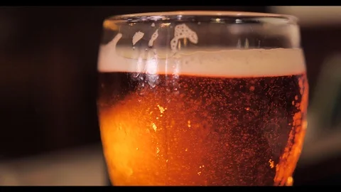 A glass of cold refreshing beer Stock Footage 92306569