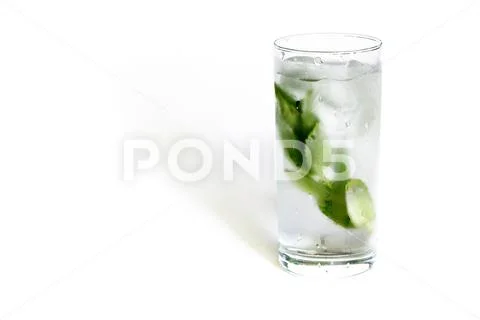 Glass of cold water with fresh mint leaves Stock Photos