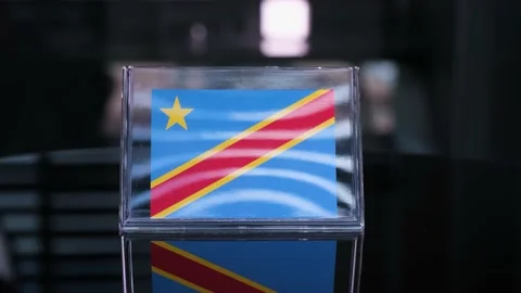 Glass Congo Democratic Flag Rotating On Table Stock-Footage 208483525