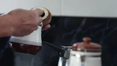 Glass container and hand 1 Stock Footage 325852893