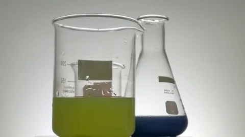 Glass containers rotating with backlighting Stock Footage 81967290